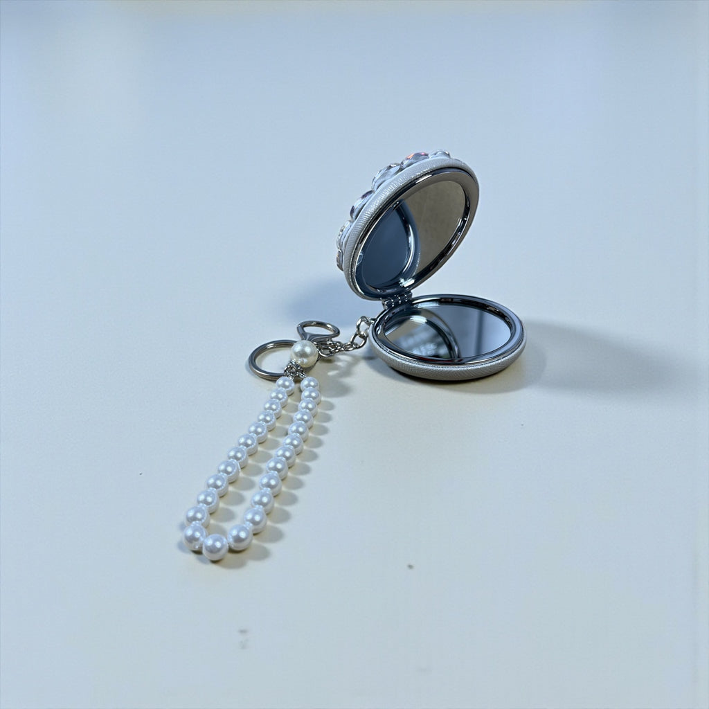 Round mirror keychain with rhinestones and pearls